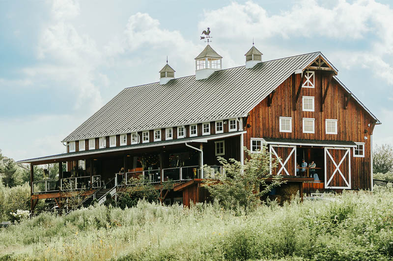 The barn through the trees